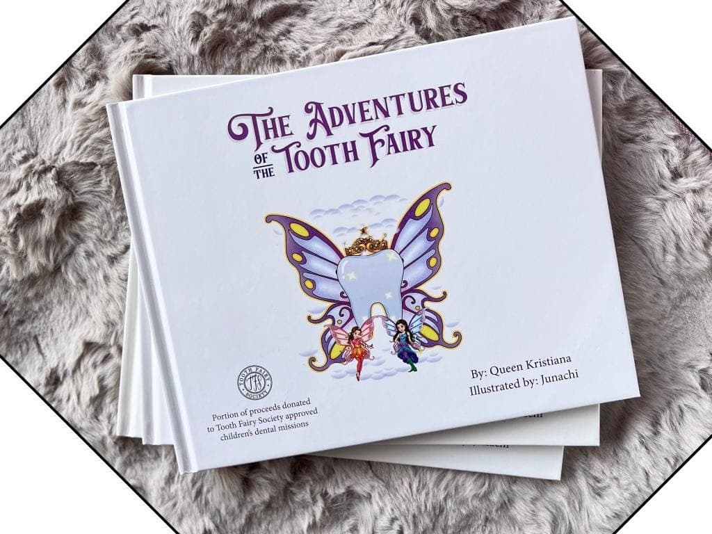 Adventures of the Tooth Fairy children's book cover on a faux fur blanket